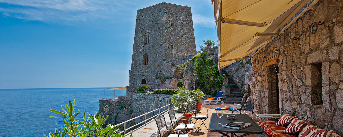 Unique accommodation in an ancient tower above the turquoise sea