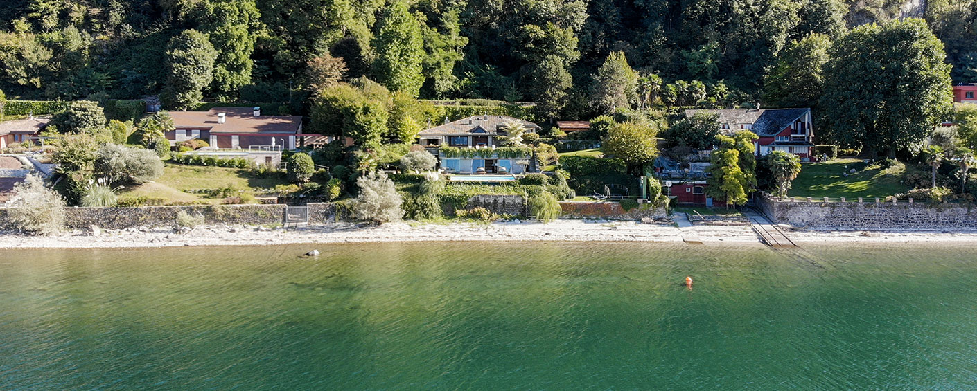 Modern villa set directly on the lakeshore